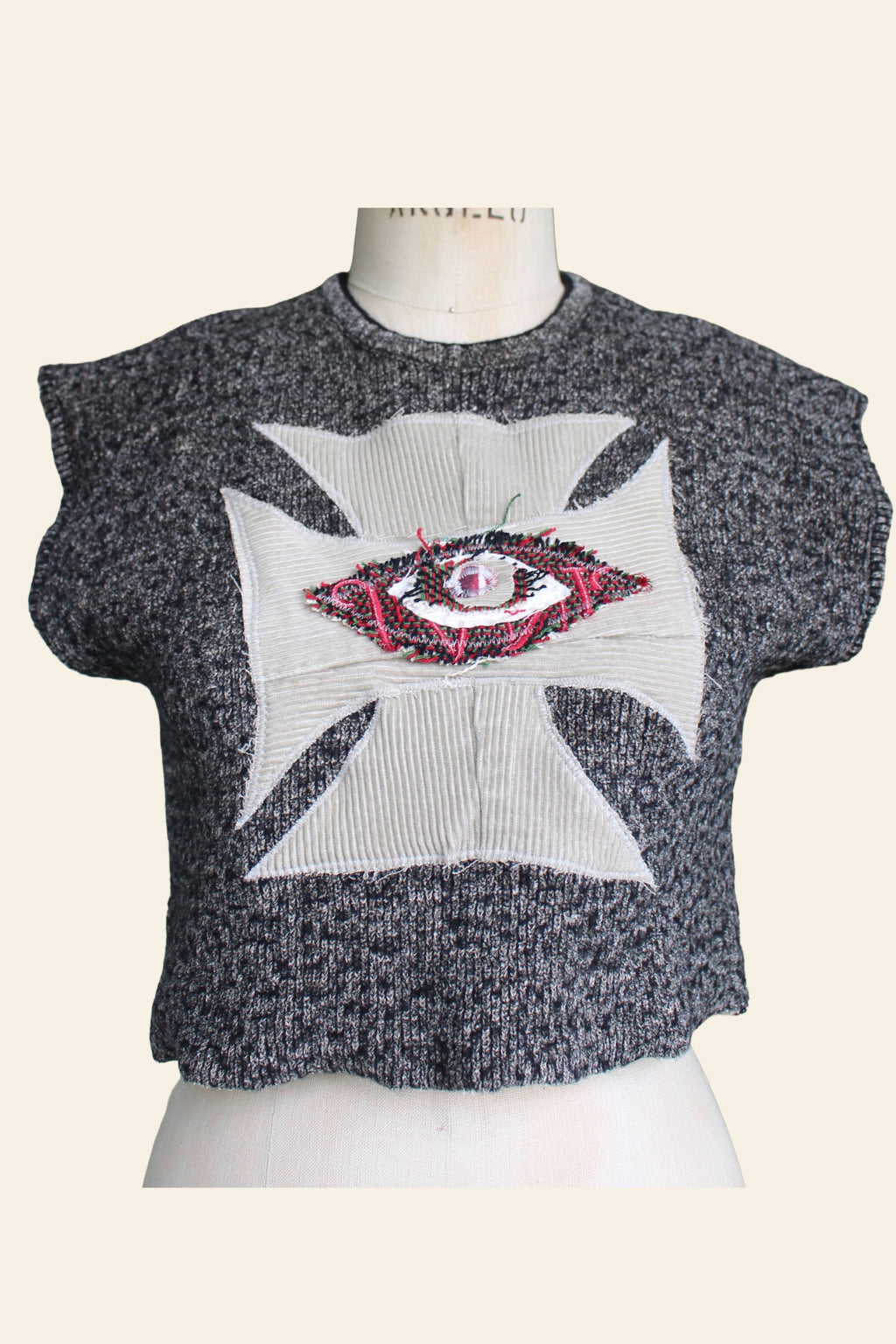 Cropped Sleeve-less Sweater